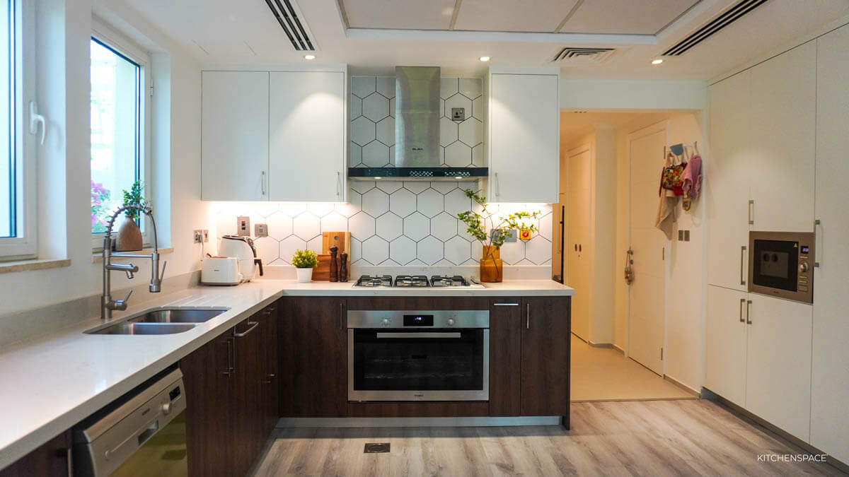 Walnut Kitchen with Geometric Backsplash